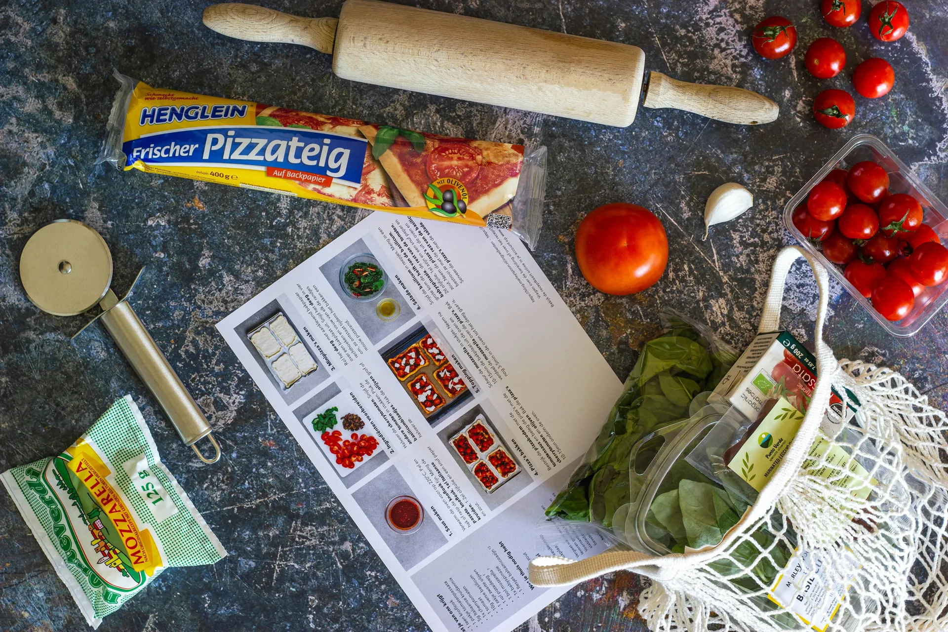 Homemade pizza ingredients and recipe plan as a budget-friendly cooking idea to save money on meals at home