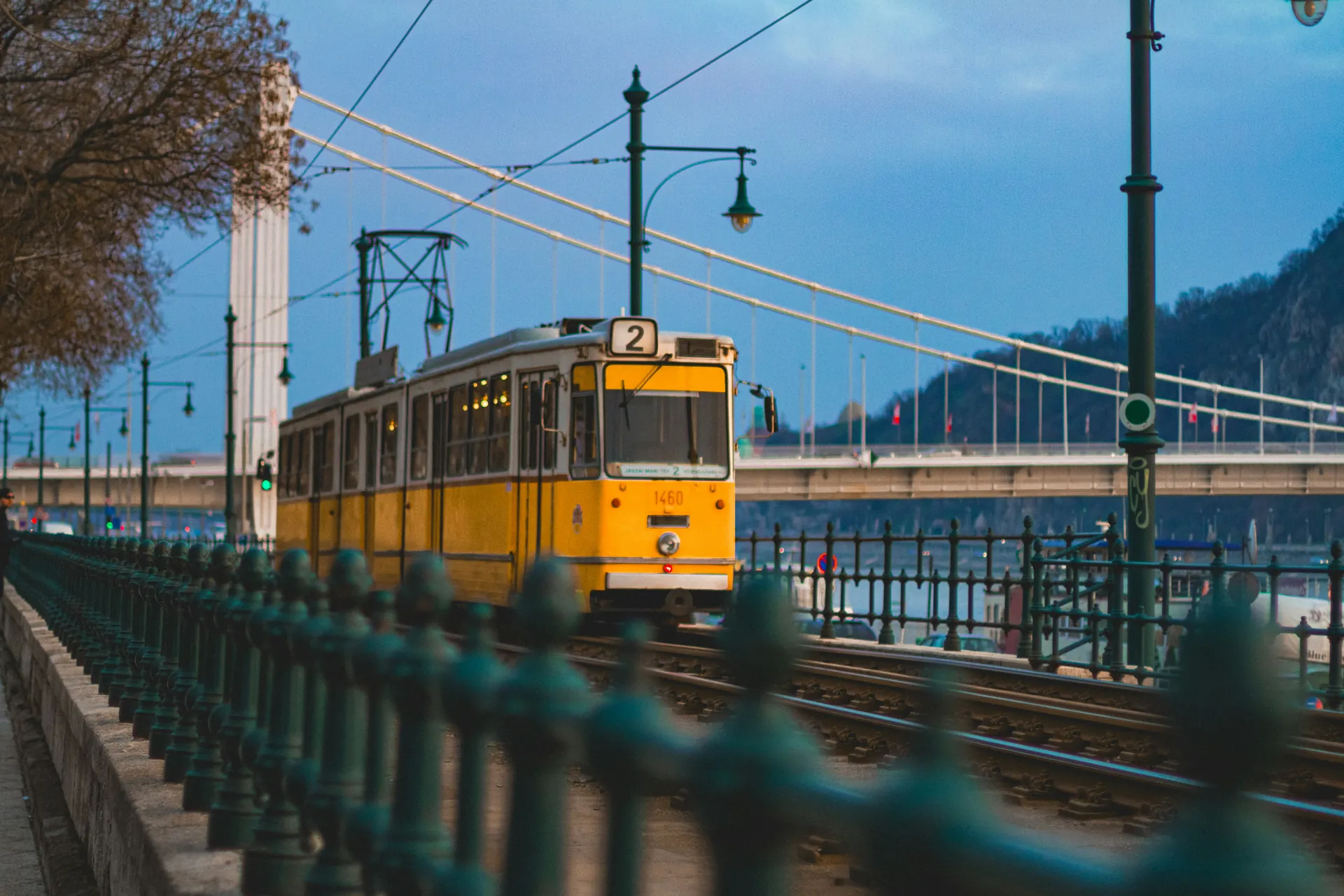 Yellow tram on route 2 as an eco-friendly public transport option to save commuting costs