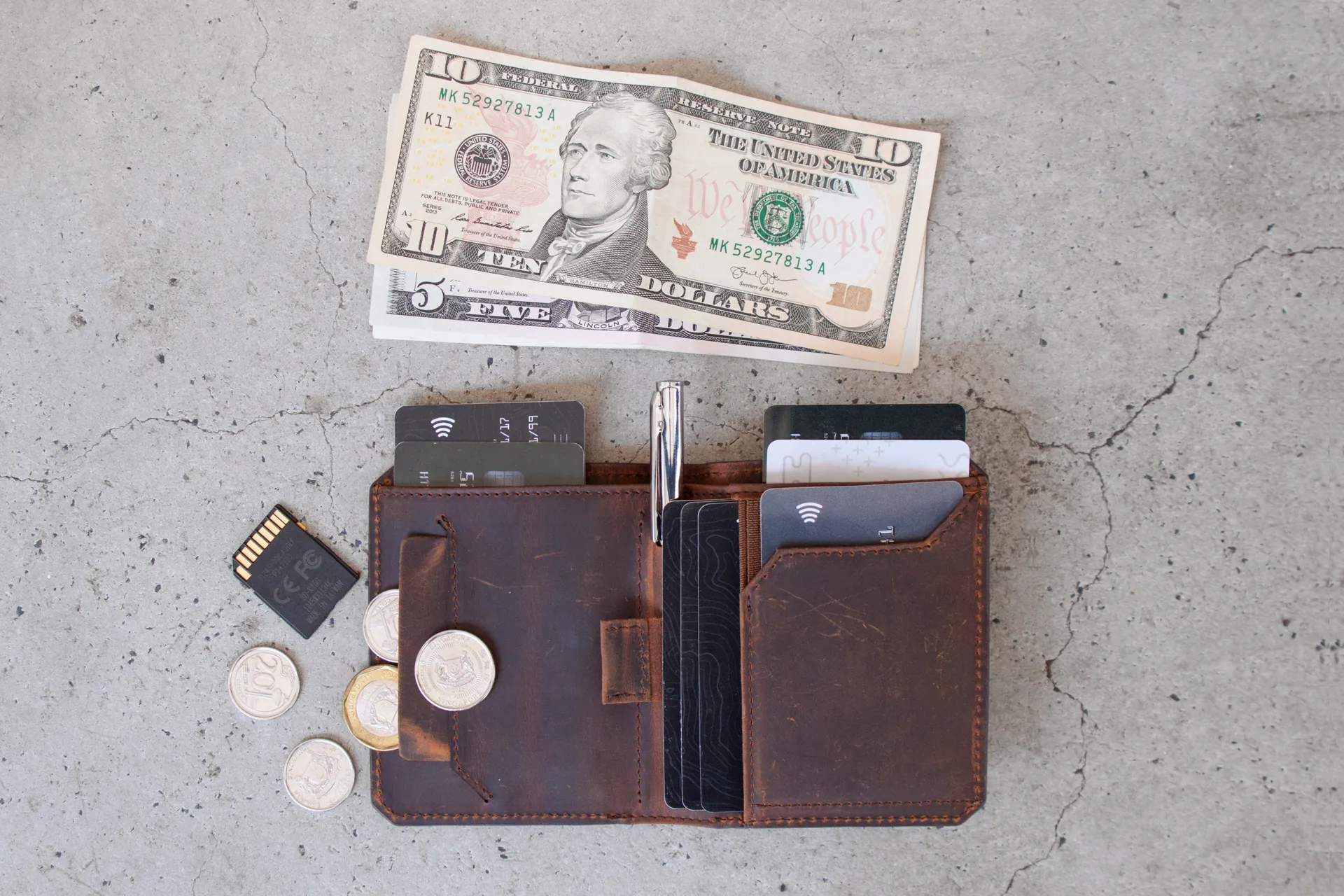 Porte monnaie, billets, pièces, carte sd